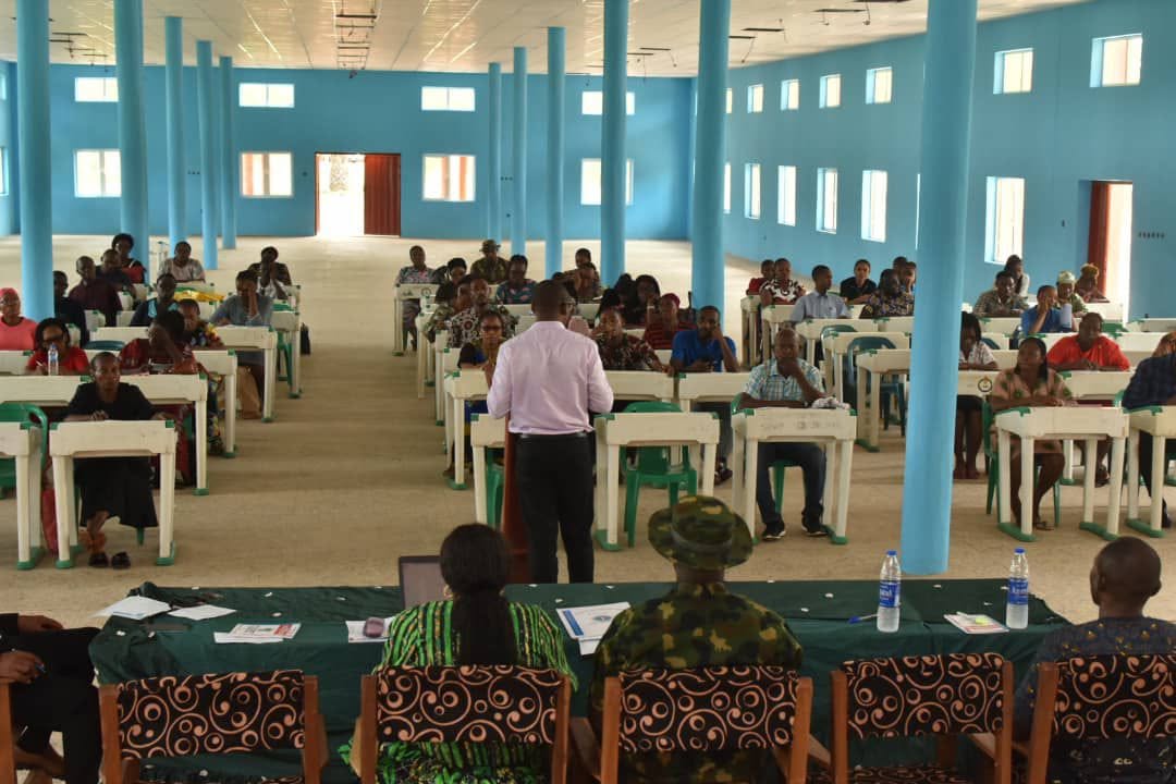 Parents consulting with school administration at Command Secondary School Abakaliki